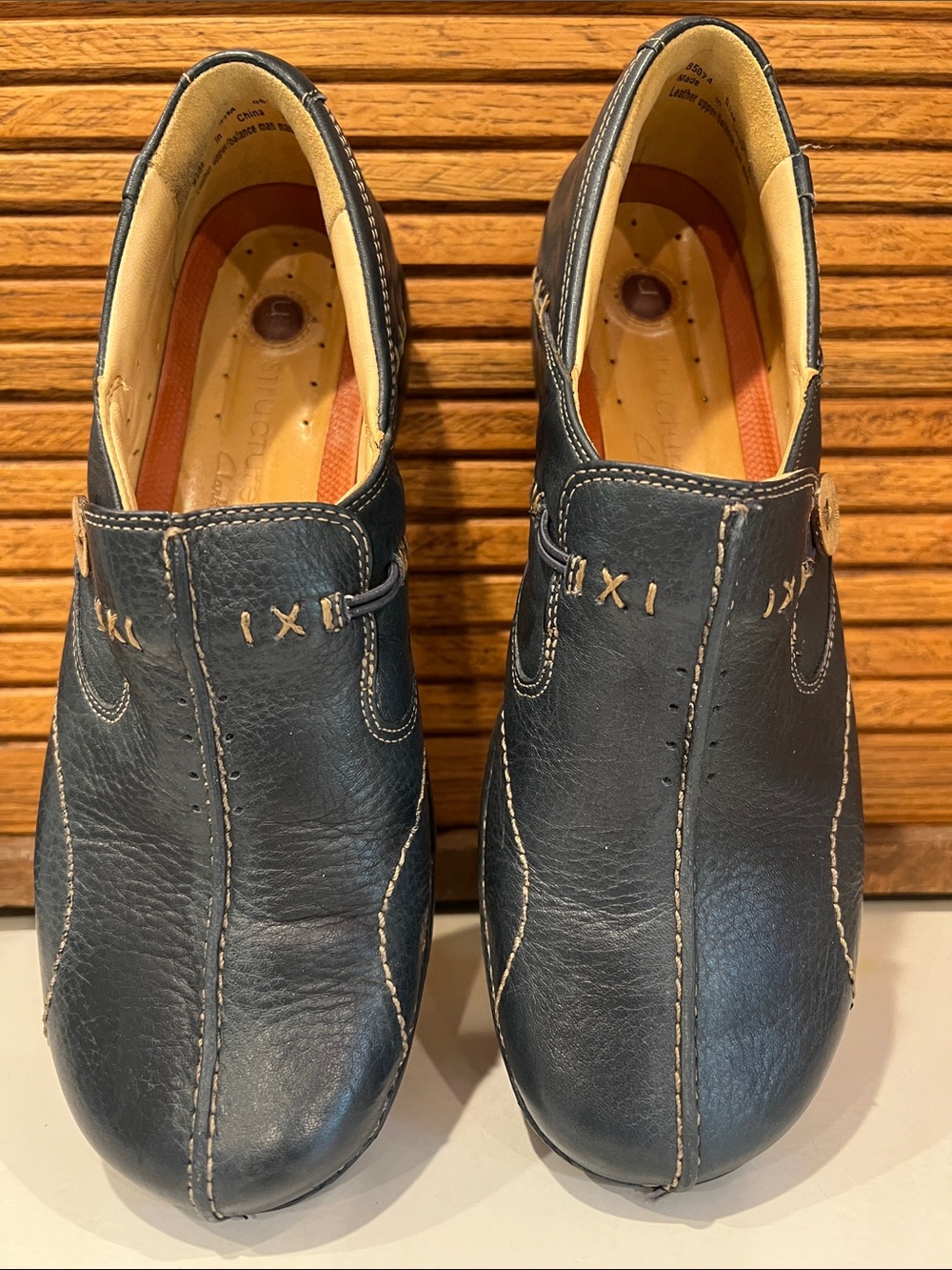 Clarks Unstructured sz. 9.5 M, slip-on comfort shoes, navy blue pebble leather